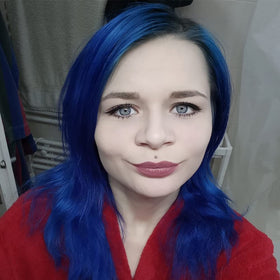 Close-up of MANIC PANIC After Midnight on blonde hair for dramatic blue.