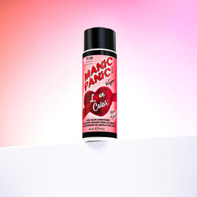 Semi-permanent color refresh with MANIC PANIC Red Desire on color-treated hair.