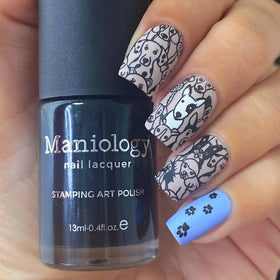 Maniology contrasting stamping idea on light base for striking nails