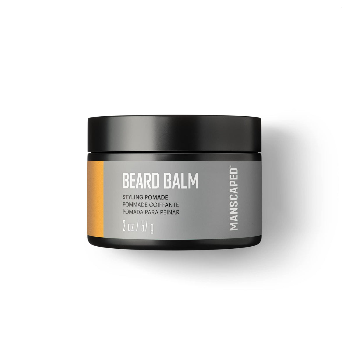 MANSCAPED Beard Balm jar close-up showing creamy texture for shaping facial hair.