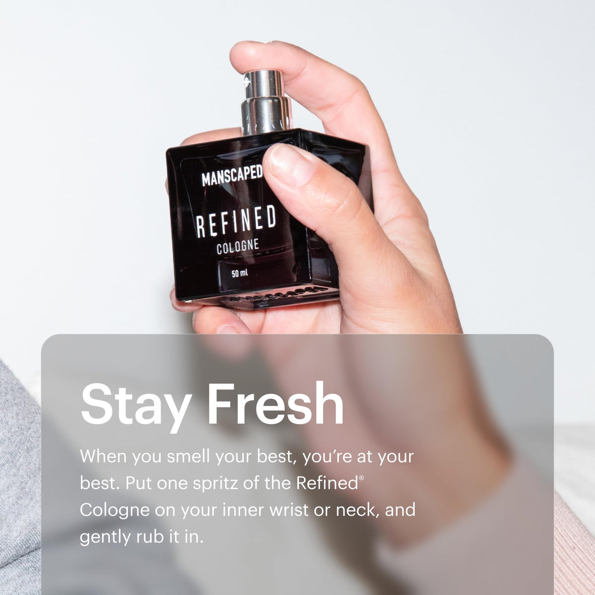 MANSCAPED Refined Cologne glass bottle and wooden cap in a premium presentation.