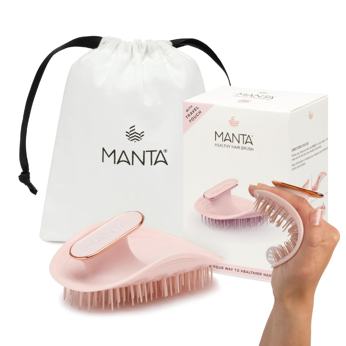 MANTA Original anti-breakage hairbrush gliding through knots for gentle detangling.