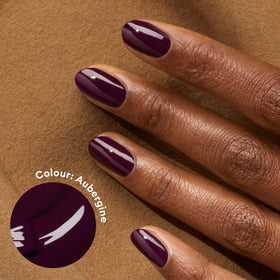 Close-up on Manucurist Green Aubergine cap highlighting precise salon-quality brush.