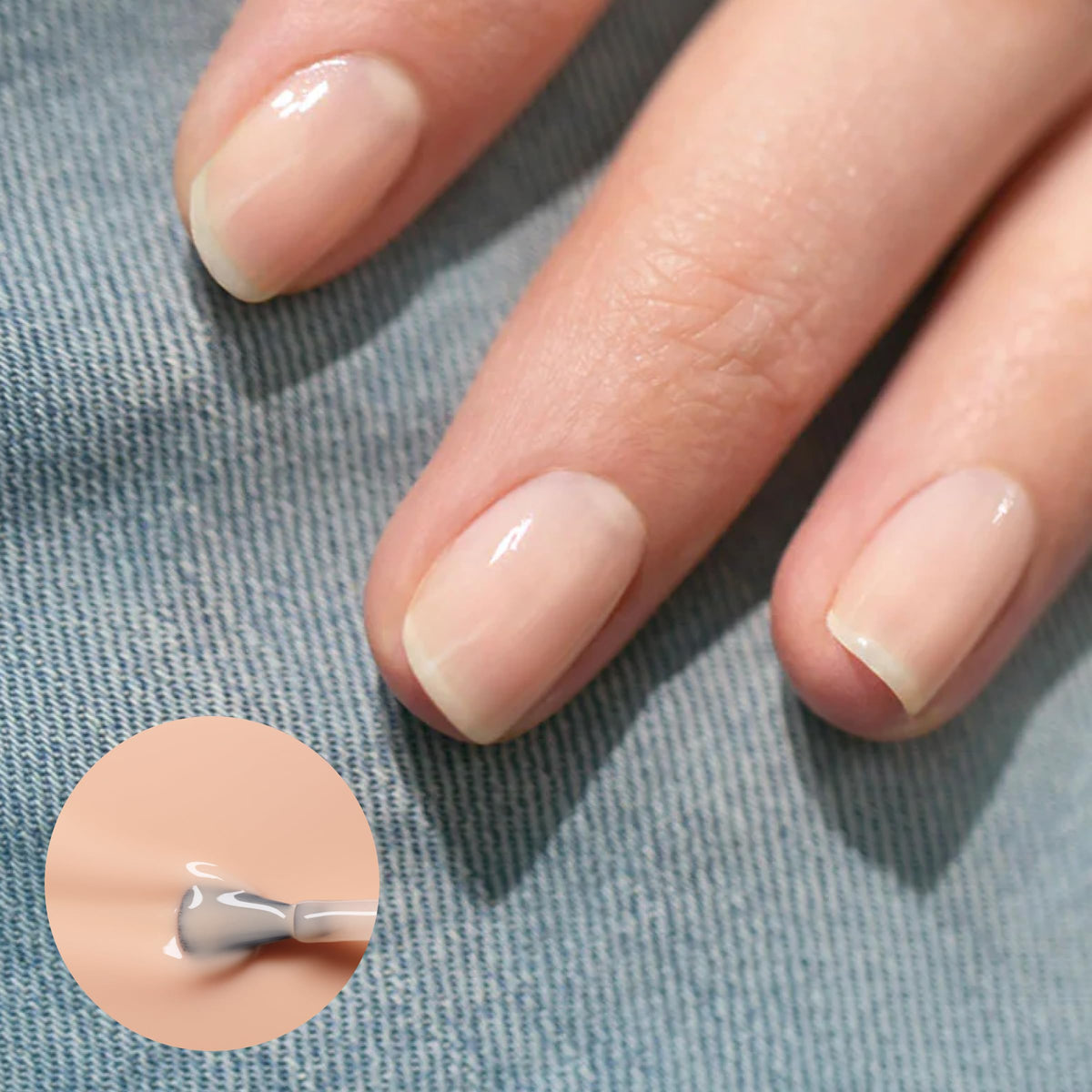 Manucurist Green Base Coat bottle priming nails for smooth application.
