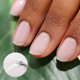 Manucurist Green Flash brush detail highlighting precision and color payoff.
