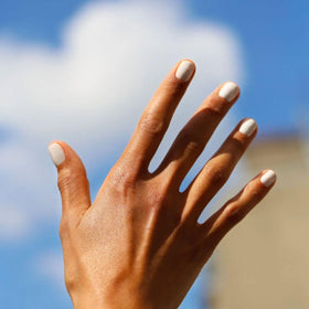 Manucurist Green Flash LED lamp curing gel layers for a durable manicure