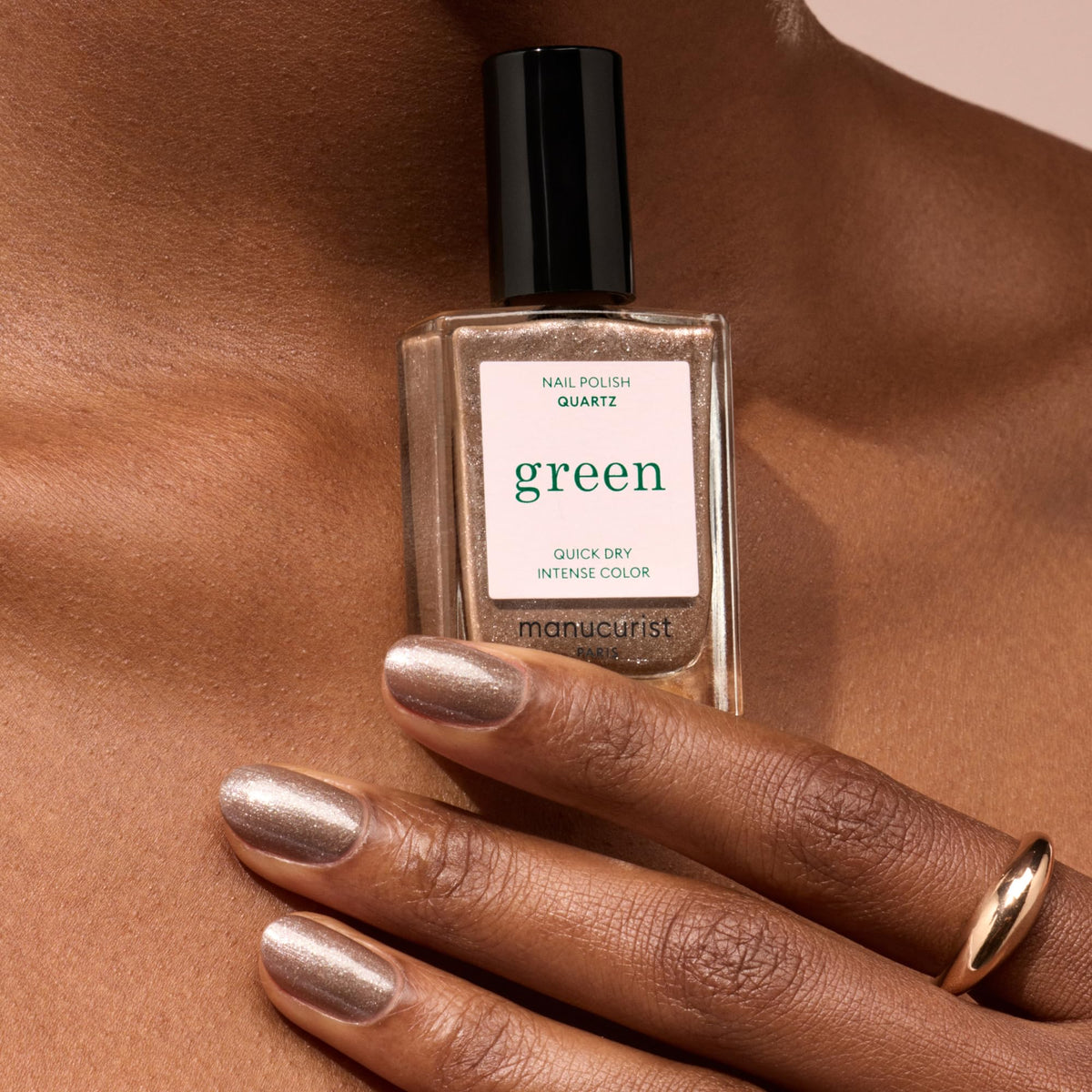 Manucurist Green bottle highlighting up to 84% plant-based ingredients for eco-friendly color.