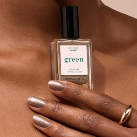 Manucurist Green bottle highlighting up to 84% plant-based ingredients for eco-friendly color.