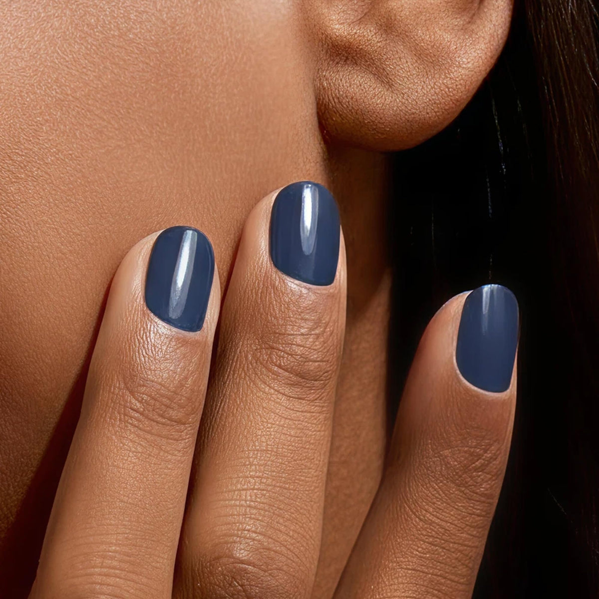 Manucurist Green Quick Dry Nail Polish Poppy Seed on nail delivers rich opaque color.