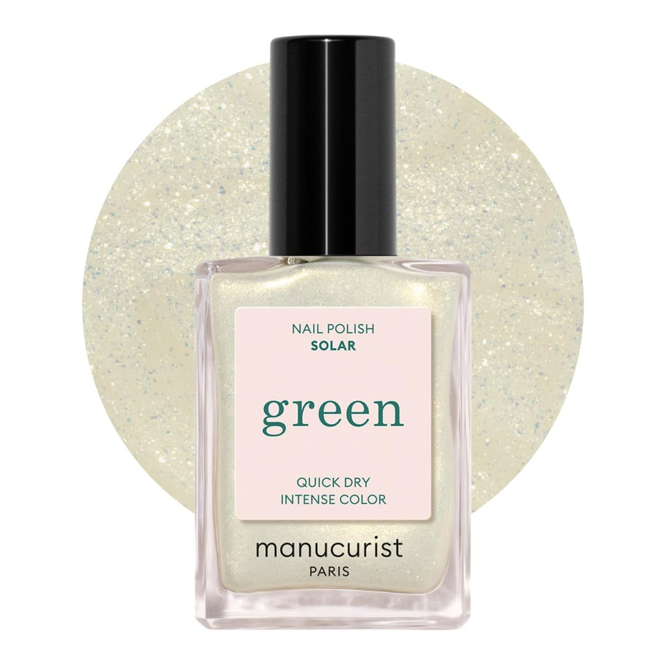 Manucurist Green Solar bottle close-up showing quick-dry formula and golden shimmer.
