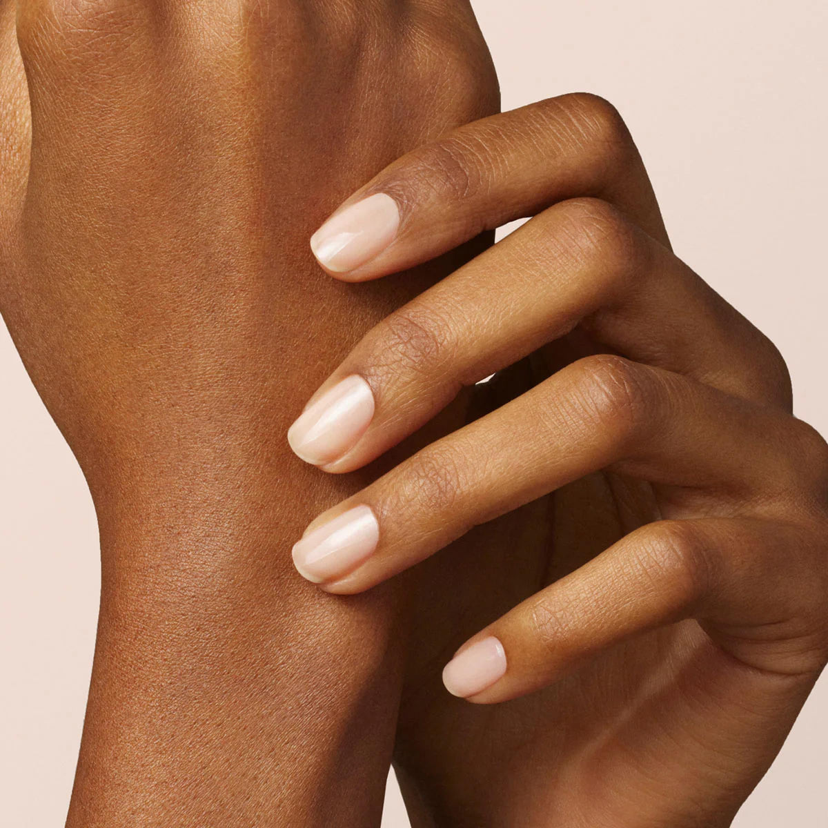 Manucurist Sunshine Top Coat bottle delivering long-lasting shine.