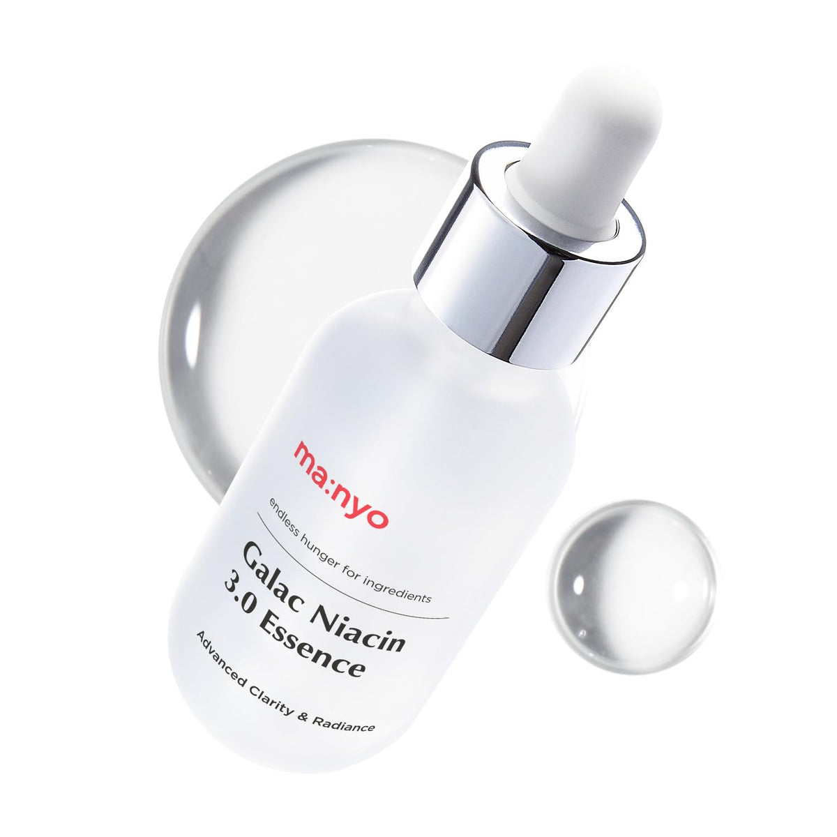 ma:nyo Galac Niacin 3.0 essence bottle closeup, fragrance-free packaging for sensitive skin.