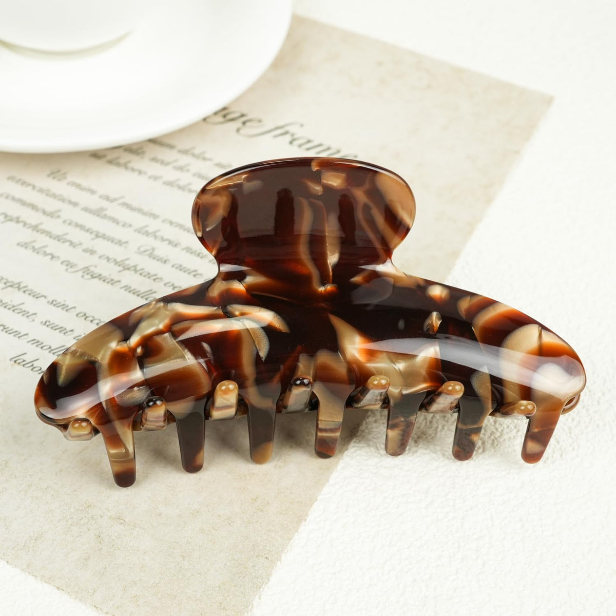 MAORULU 4-inch clip ideal for thick and thin hair styling.