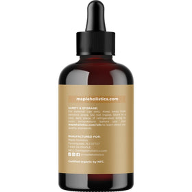 Maple Holistics Organic Jojoba Oil drops on skin; quick-absorb moisturizing feel