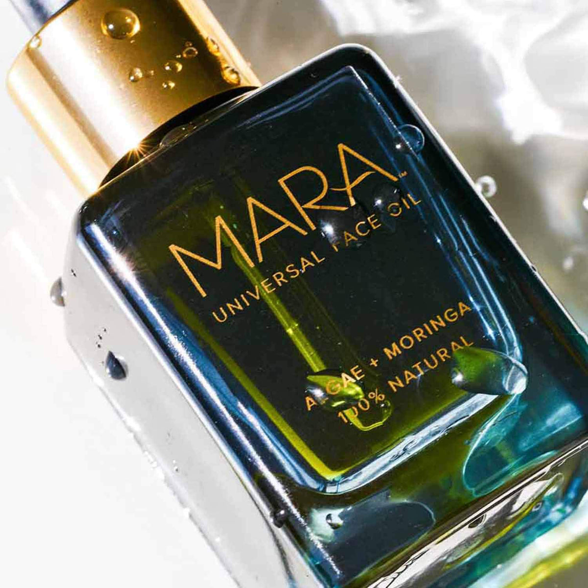 MARA Universal Face Oil glow shot hints radiant, healthy-looking skin.