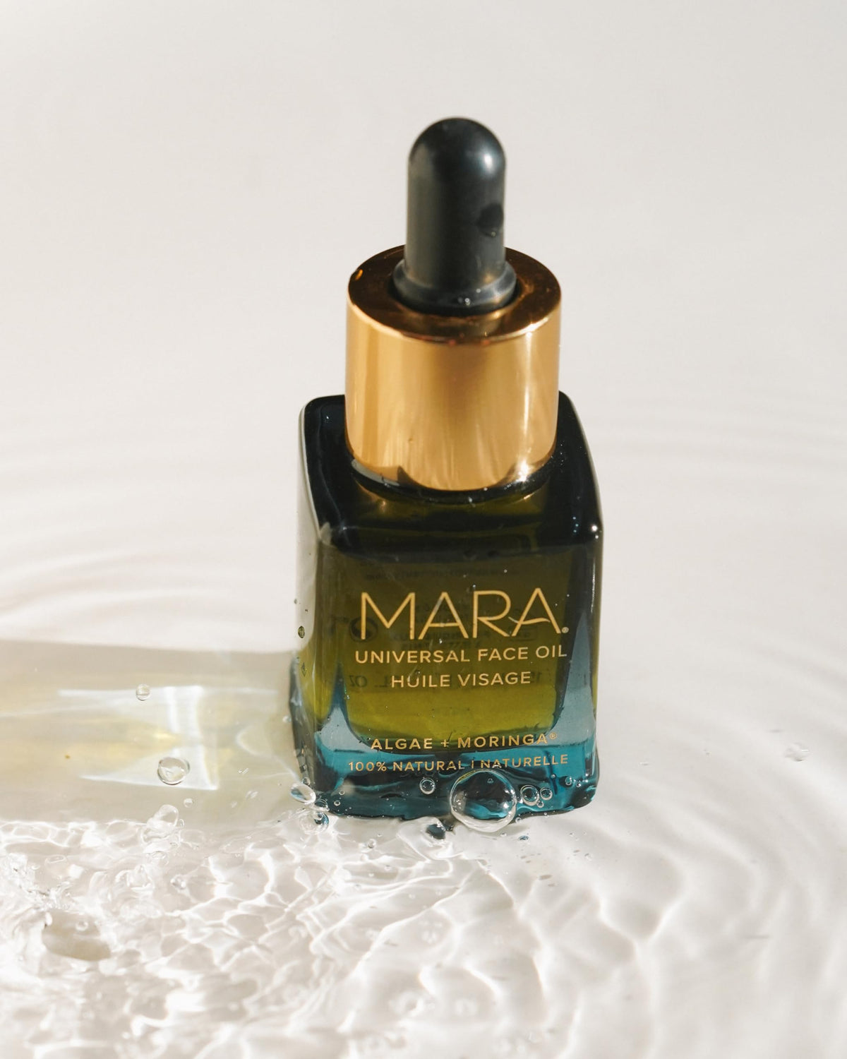 MARA Universal Face Oil texture swirl reveals silky, non-greasy feel and skin-plumping potential.