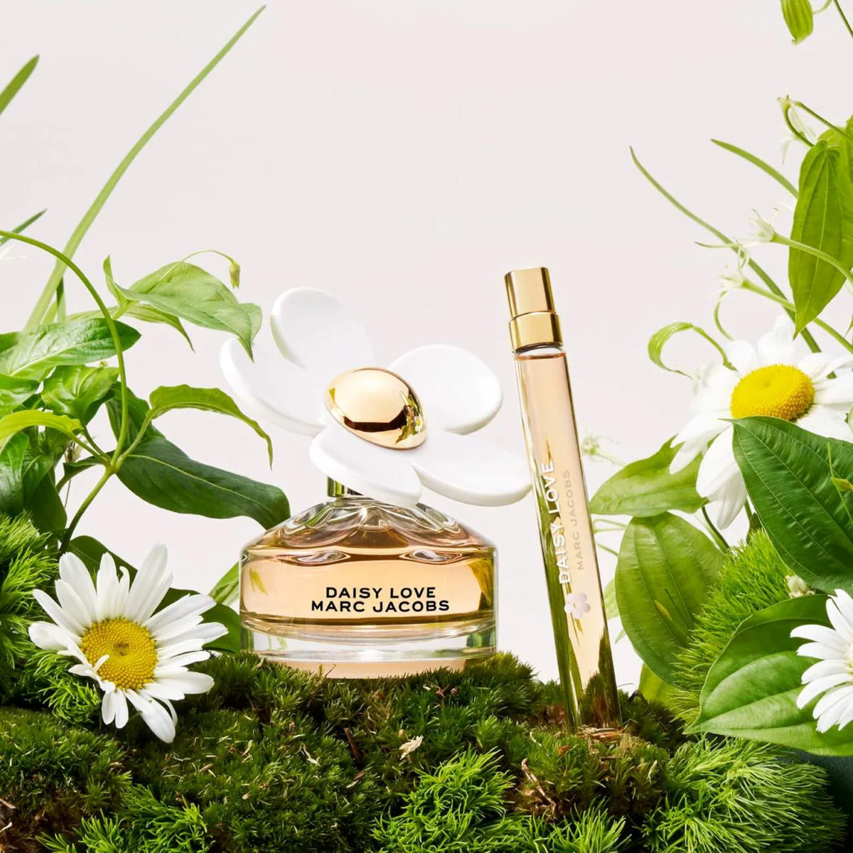 Marc Jacobs Daisy Love cap detail close-up emphasizing luxury packaging