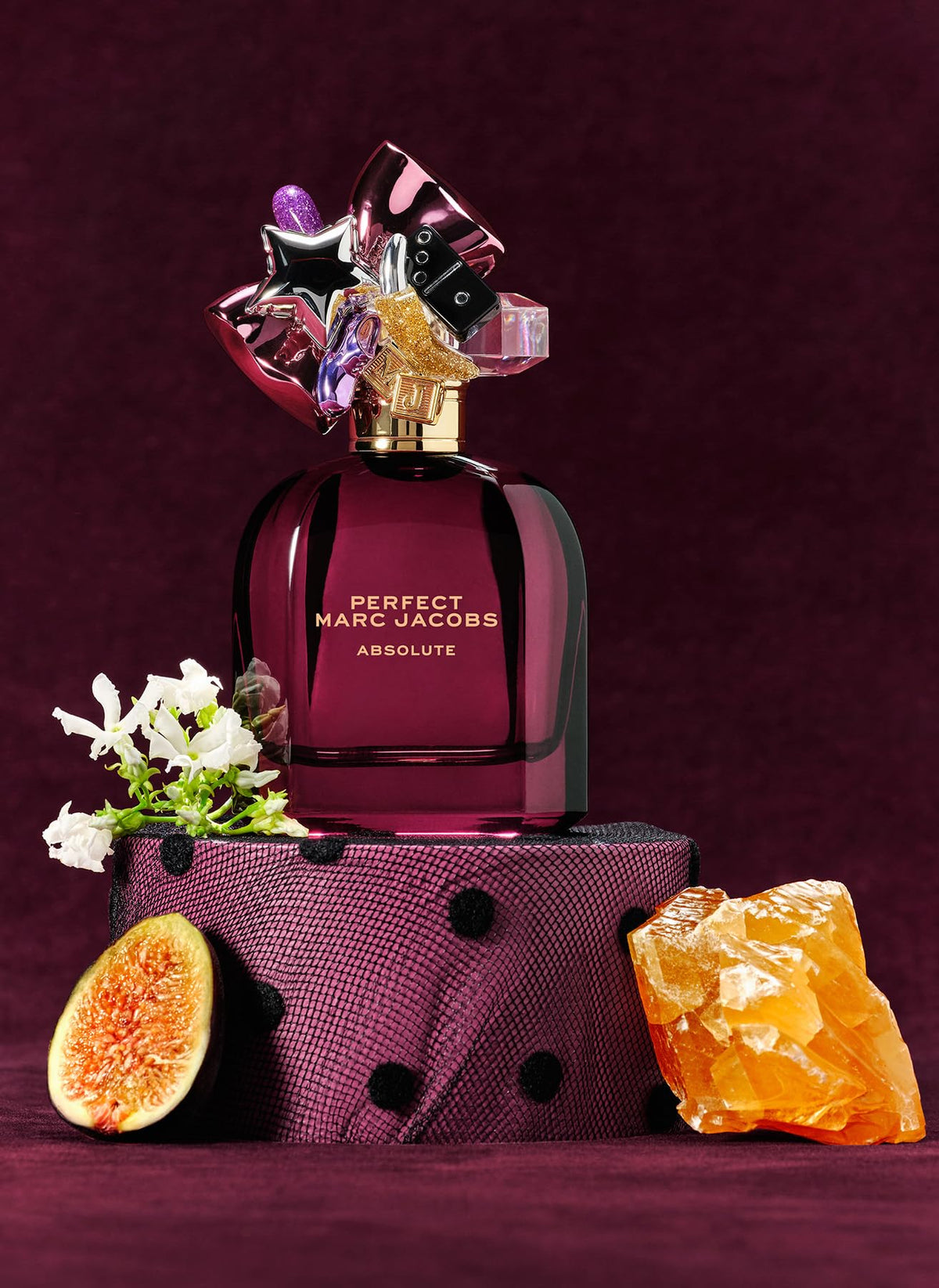 Marc Jacobs Perfect Absolute caramelized fig accord detail, suggesting warm sweetness for evening wear.