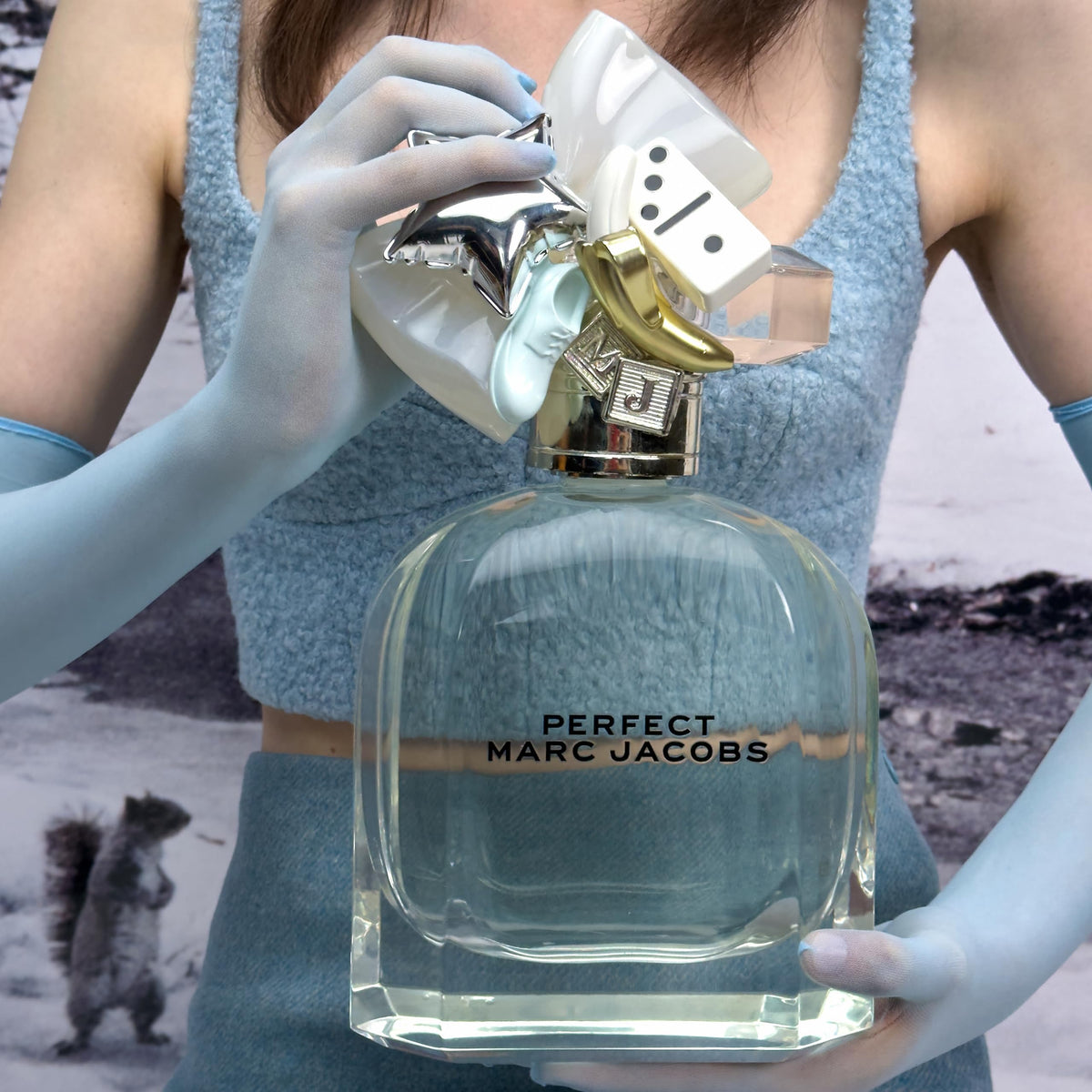 Marc Jacobs Perfect EDT travel spray rosy hue ideal for day to night.