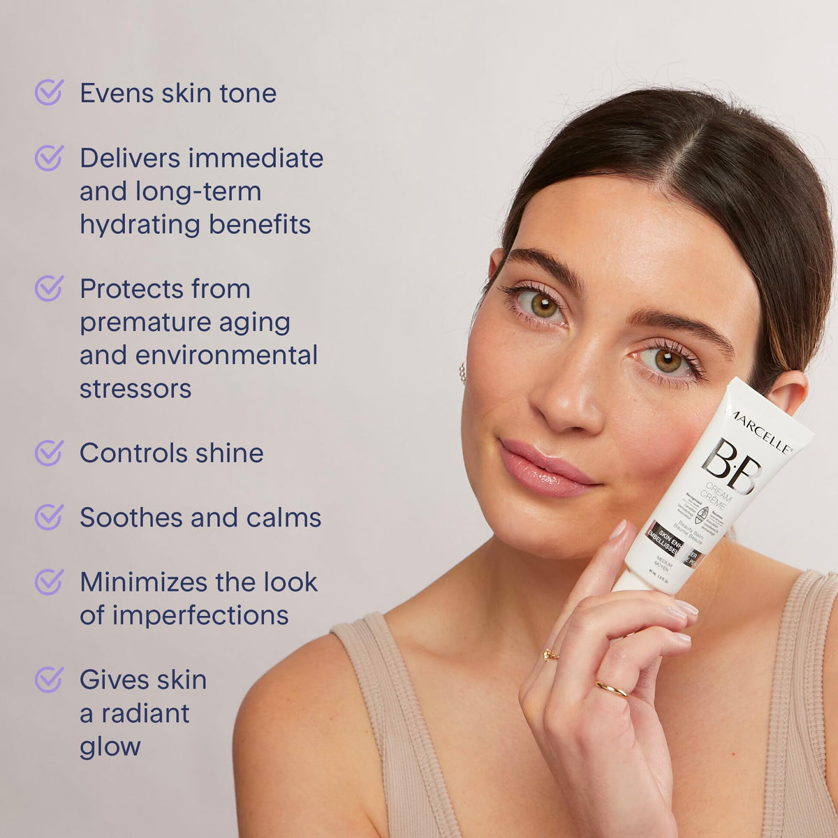 Marcelle BB Cream Beauty Balm light swatch blending with fair skin for natural tone.