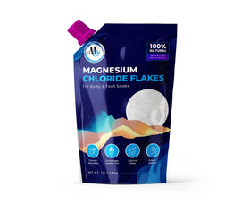 MARCO ESRA Dead Sea magnesium flakes bath salts in a tub for a soothing soak.