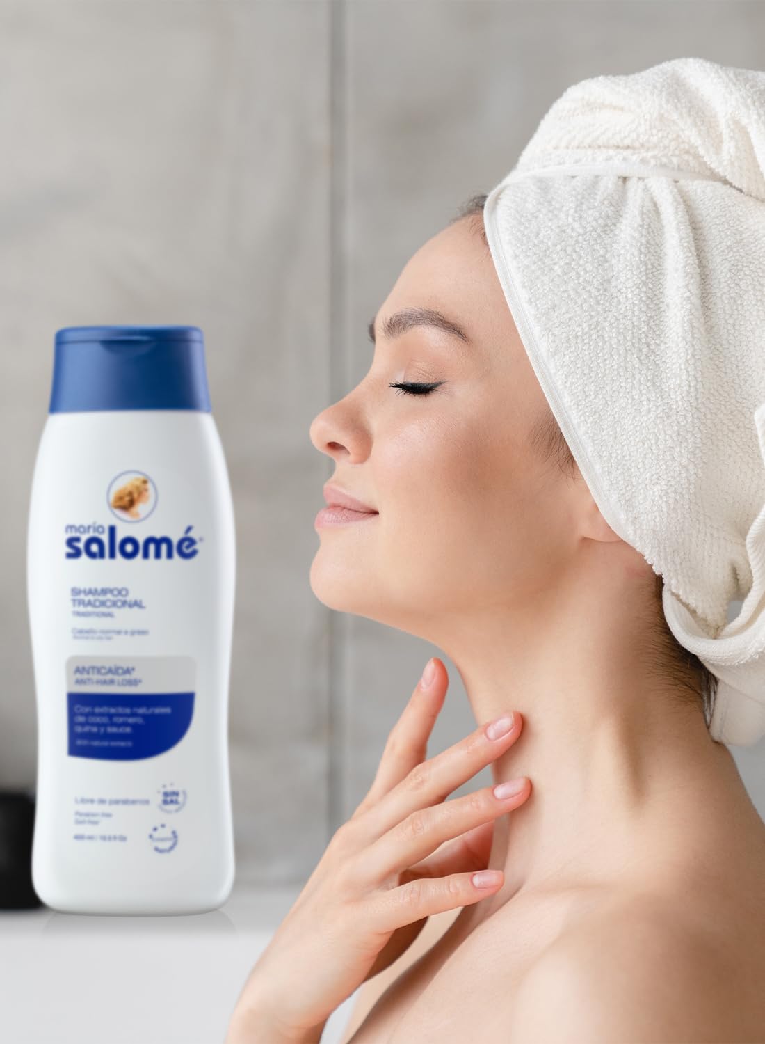 Foam forming on scalp during gentle circular massage with Maria Salomé Shampoo