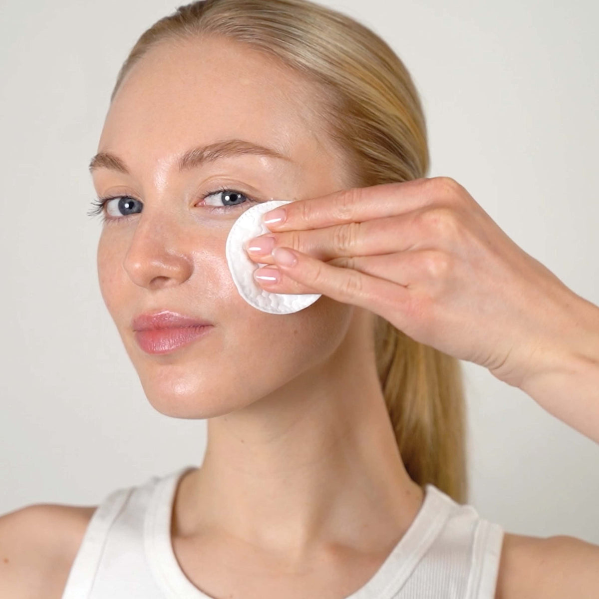 Mario Badescu Glycolic Toner label closeup highlights grapefruit and aloe benefits.