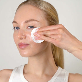 Mario Badescu Glycolic Toner label closeup highlights grapefruit and aloe benefits.