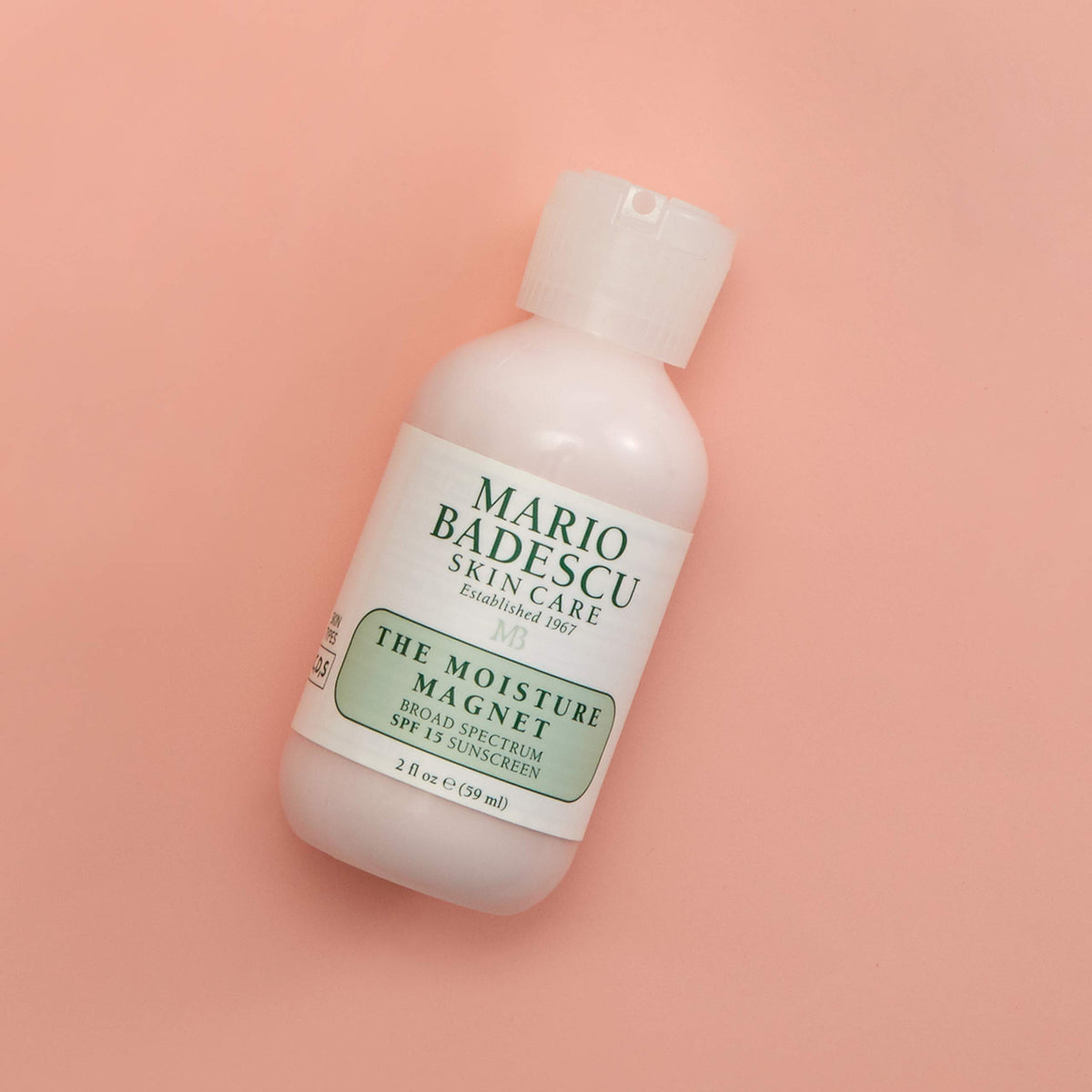 Mario Badescu Moisture Magnet SPF15 packaging on display for easy shopping.