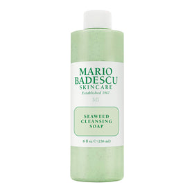 Mario Badescu Seaweed Cleansing Soap bottle with creamy texture for gentle exfoliation.