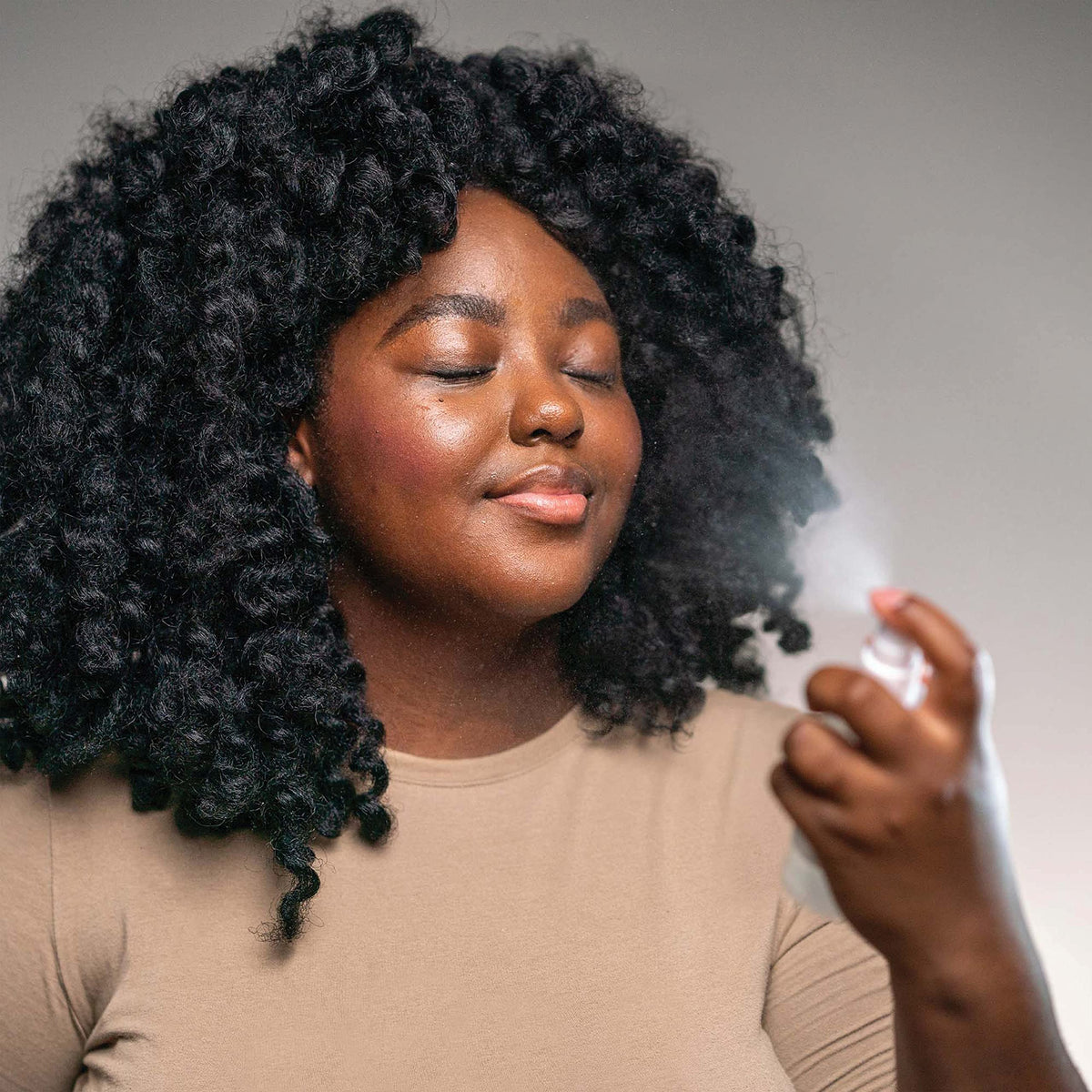 Hyaluronic acid and niacinamide in Mario Badescu spray for lasting moisture