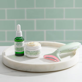 Mario Badescu massager provides a warm neck massage to firm and reduce puffiness