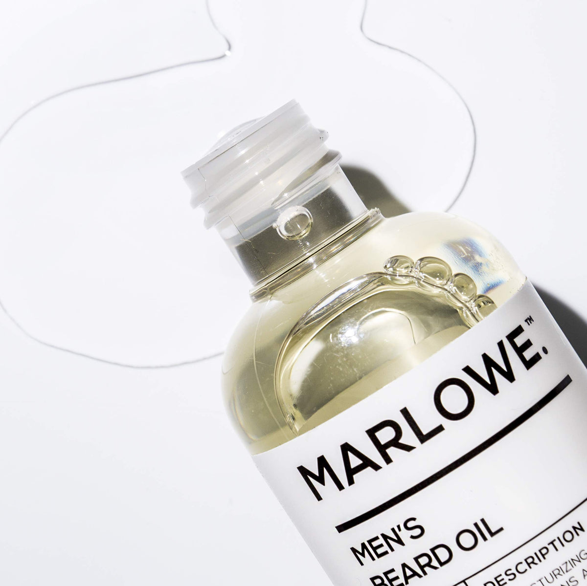 Close-up of beard oil texture on beard hair for nourishment and manageability.