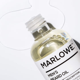 Close-up of beard oil texture on beard hair for nourishment and manageability.