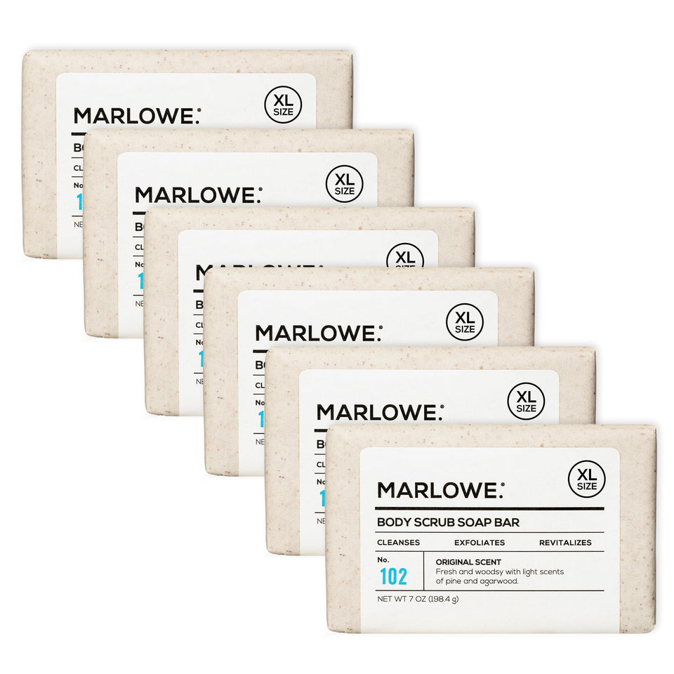 MARLOWE No. 102 body scrub bar close-up shows pumice for exfoliation.