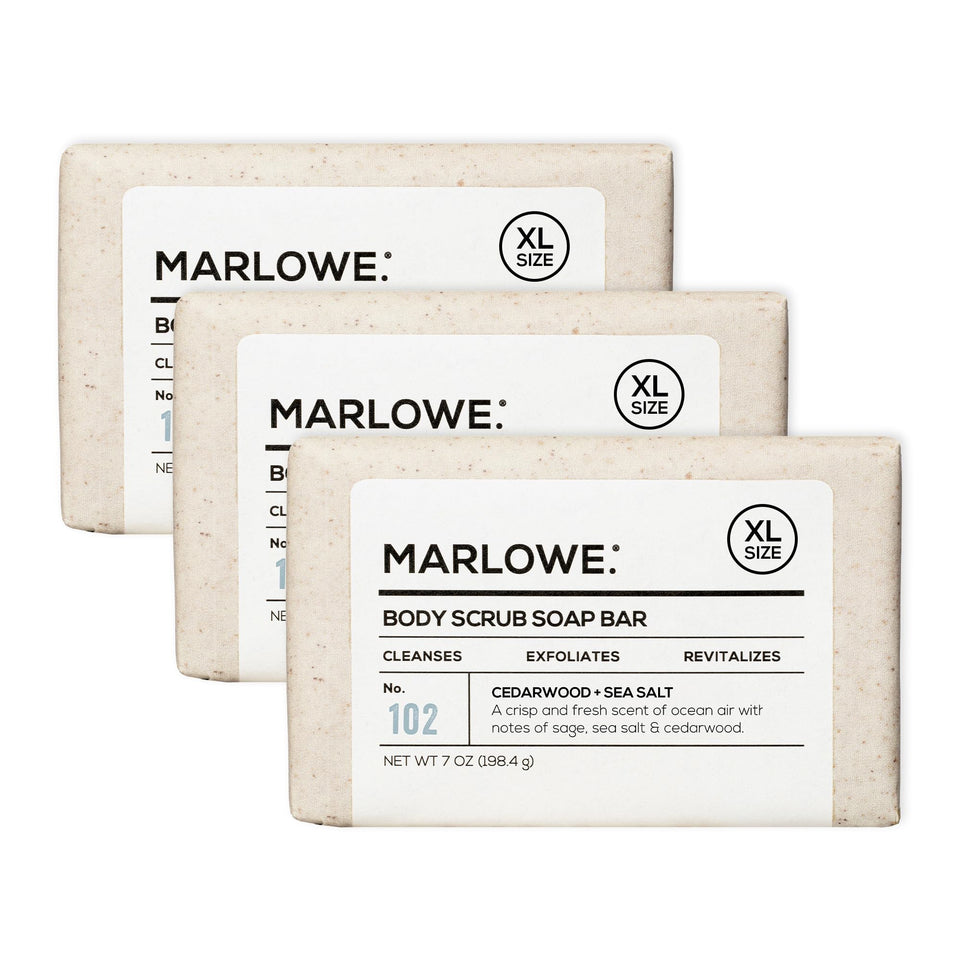 Marlowe No. 102 cedarwood sea salt scrub bar close-up for smoother skin.
