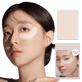 Marshique hydrogel under-eye patches being applied for puffiness care.