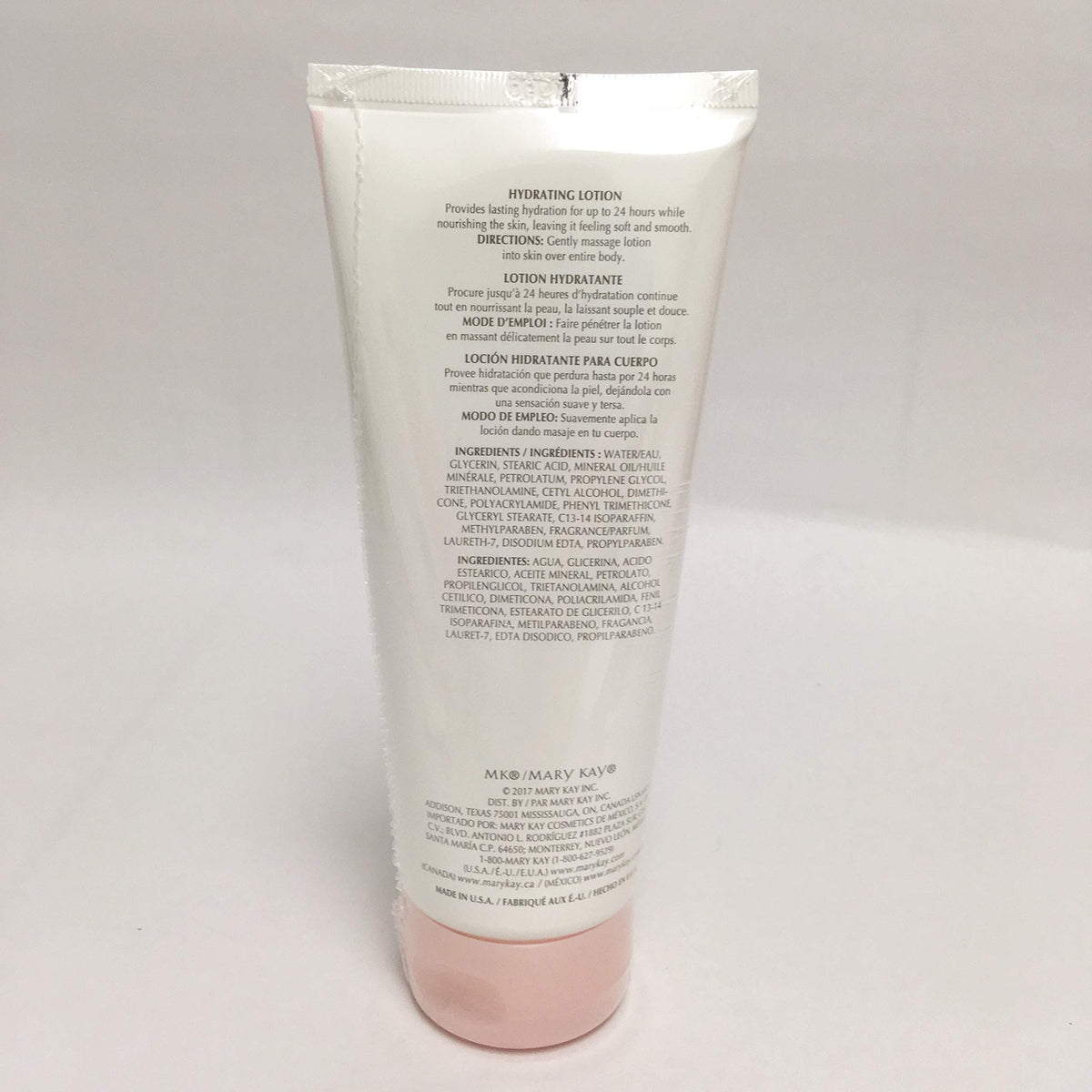 Mary Kay Hydrating Lotion label close-up highlighting long-lasting hydration.