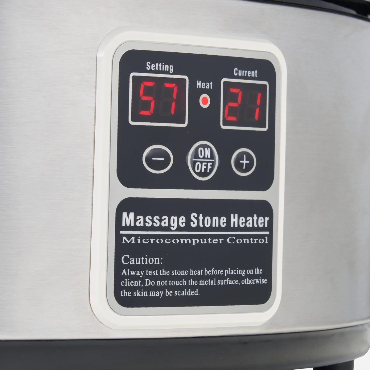 Movable inner pot for easy loading of stones in Master Massage heater