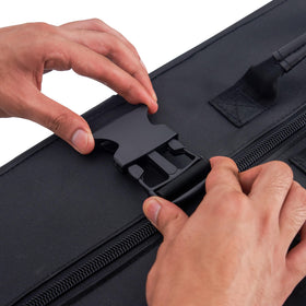 Five storage pockets organize towels, oils, and bolsters for mobile sessions.