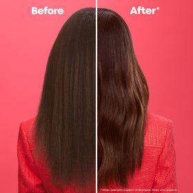 Applying Matrix Glow Mania Mask to damp hair for glossy color.