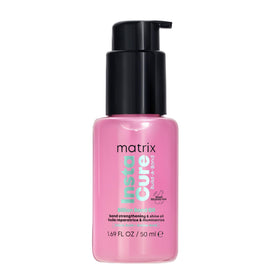 Matrix Instacure Billion Bond Oil bottle focus showing bond repair for damaged hair.