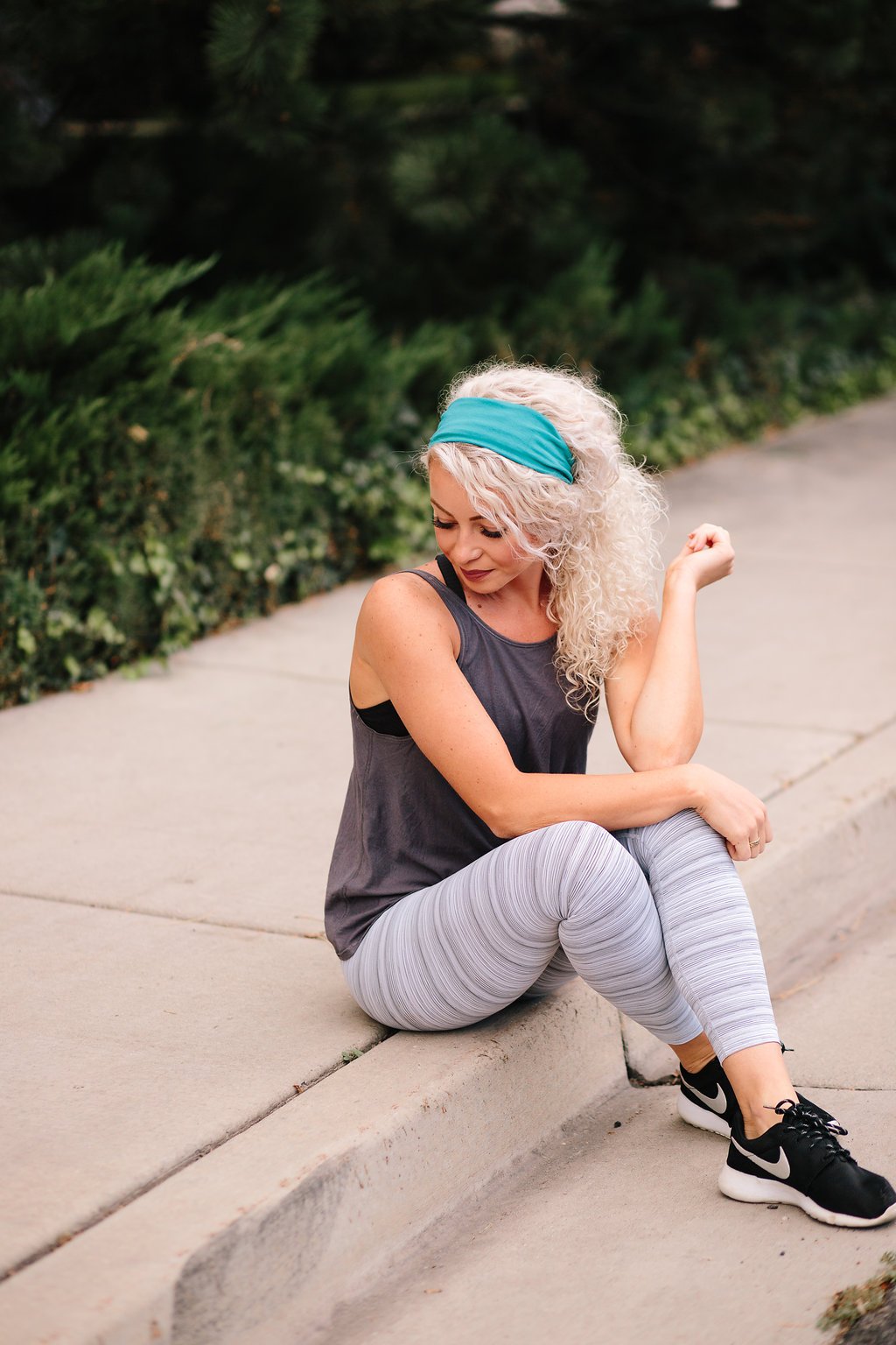 Maven Thread Bayside headband worn by a woman during a workout.