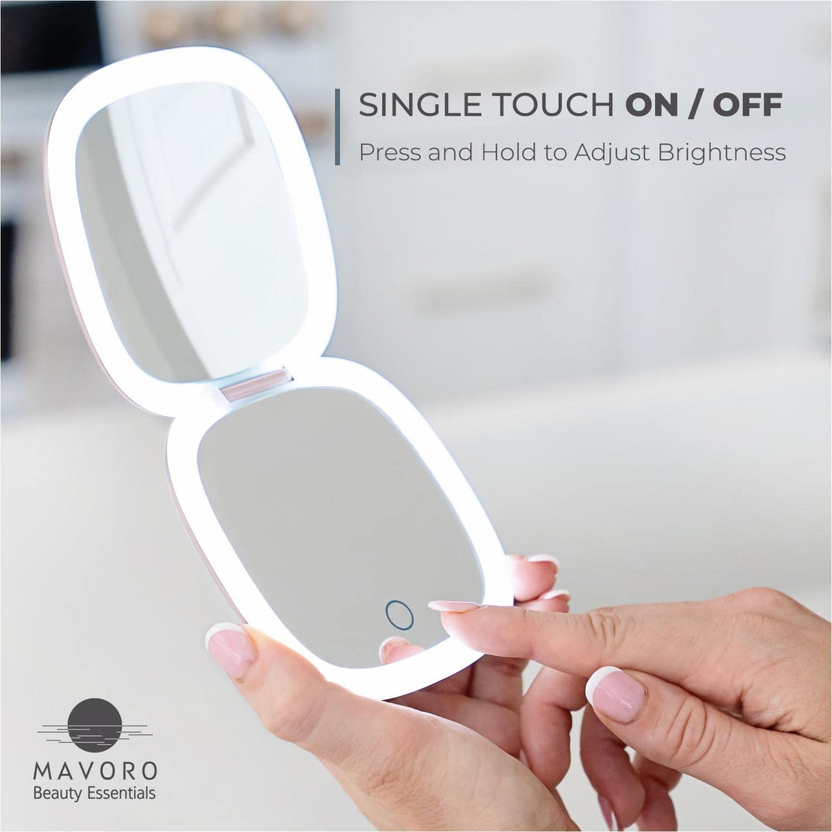 Mavoro LED travel mirror open in hand showing compact, purse-ready design.