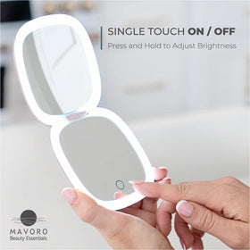Mavoro LED travel mirror open in hand showing compact, purse-ready design.