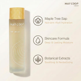 Close-up of MAY COOP bottle showing maple sap and centella ingredients