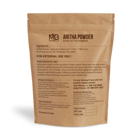 MB Herbals Aritha Powder on spoon, pure soapnut powder for DIY shampoos