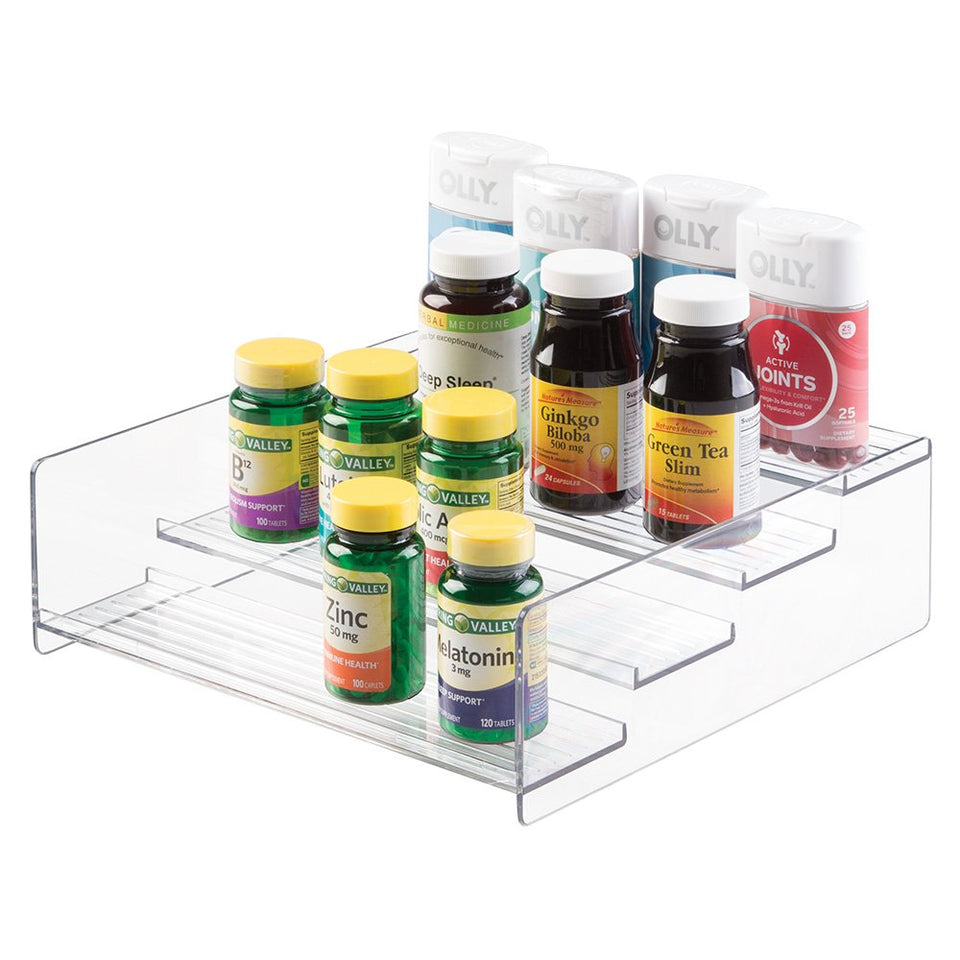 MDesign Ligne Collection 4-tier bathroom shelf holding vitamins and bottles for easy access.