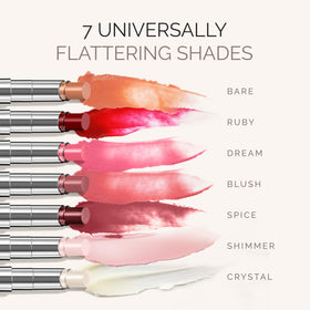 Applying tinted lip balm on lips for smooth color and shine