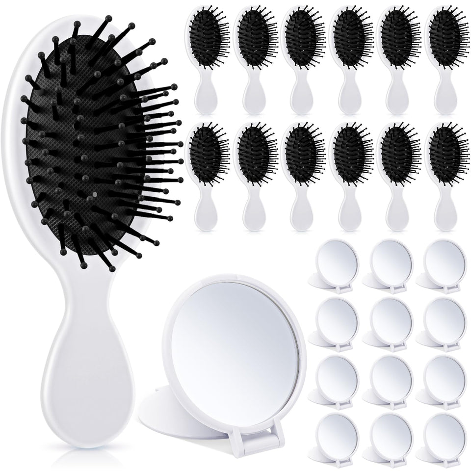 Meanplan mini detangler brush in white for gentle detangling across hair types.